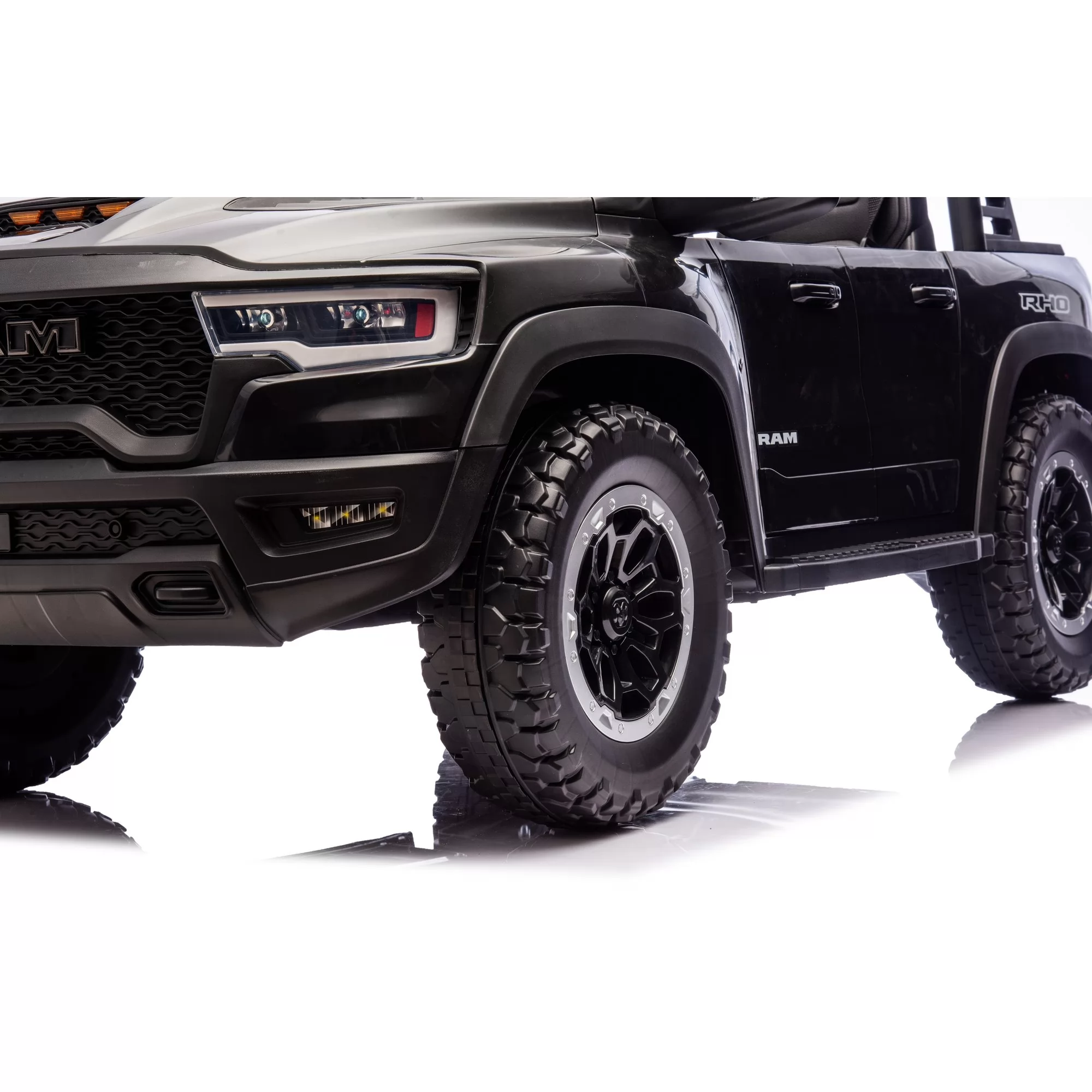 Official Licensed Dodge Ram 1500 RHO Super Truck 12V Kids Ride-On Car – Two-Seater Pickup with 2.4G Remote Control, LED Spotlight Bar & MP3